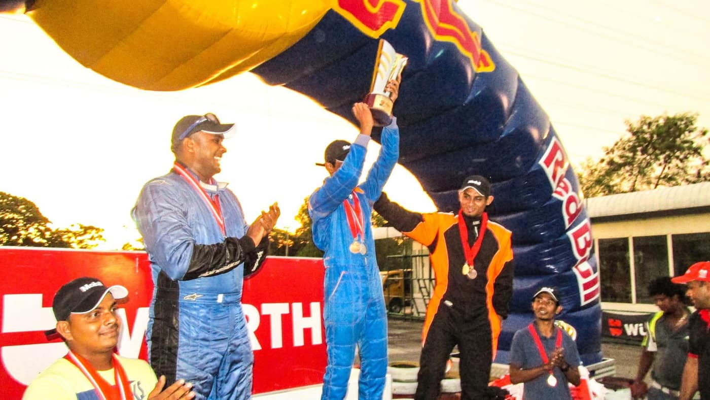 Podium under the Red Bull arch, the year of the 26.95s lap record